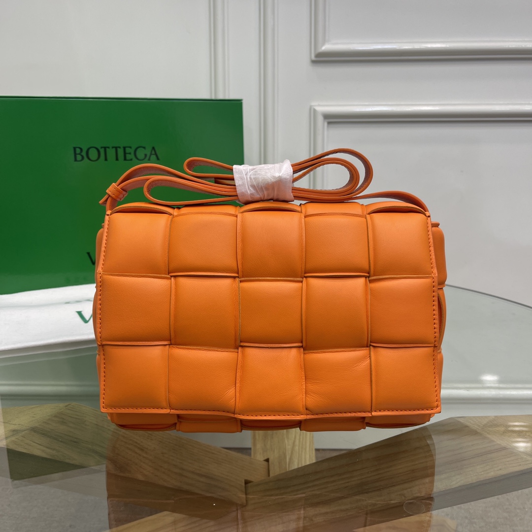 Bottega-Veneta-Large-Padded-Cassette-Intreccio-Leather-Cross-body-Bag-Orange.jpg