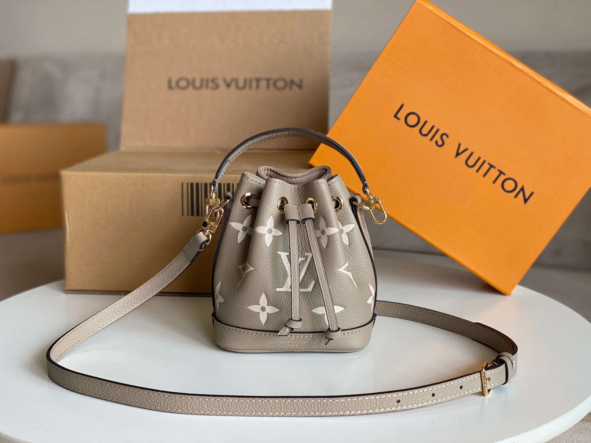 Louis-Vuitton-M46291-Nano-Noe-Monogram-Empreinte-embossed-supple-Grained-Cowhide-Leather.jpg