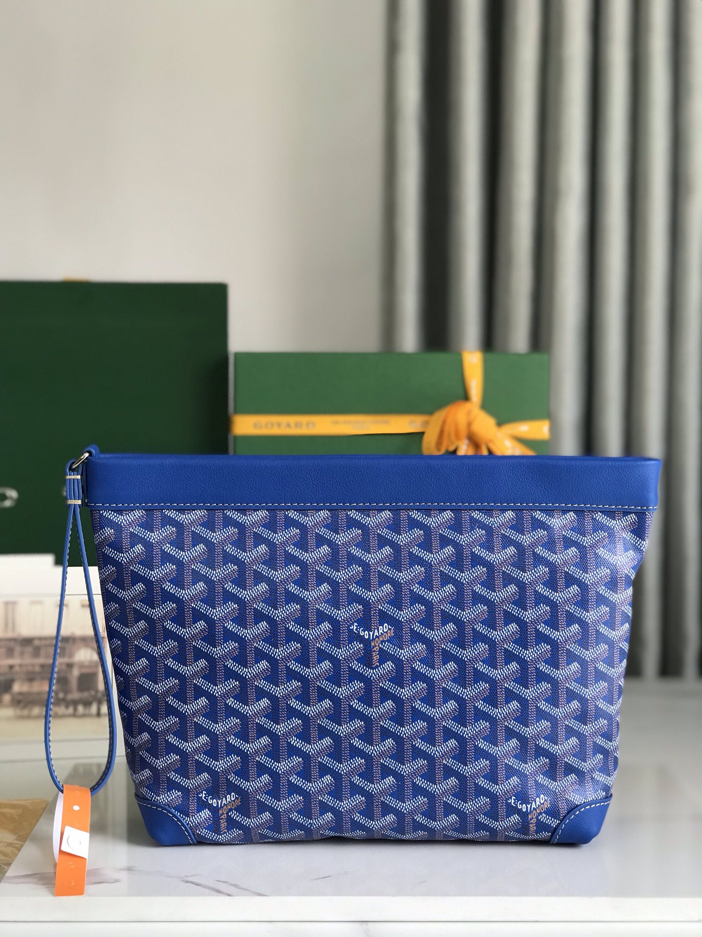 Goyard-Conti-Pouch-Goyardine-Canvas-and-Chevroches-Calfskin-Sky-Blue.jpg