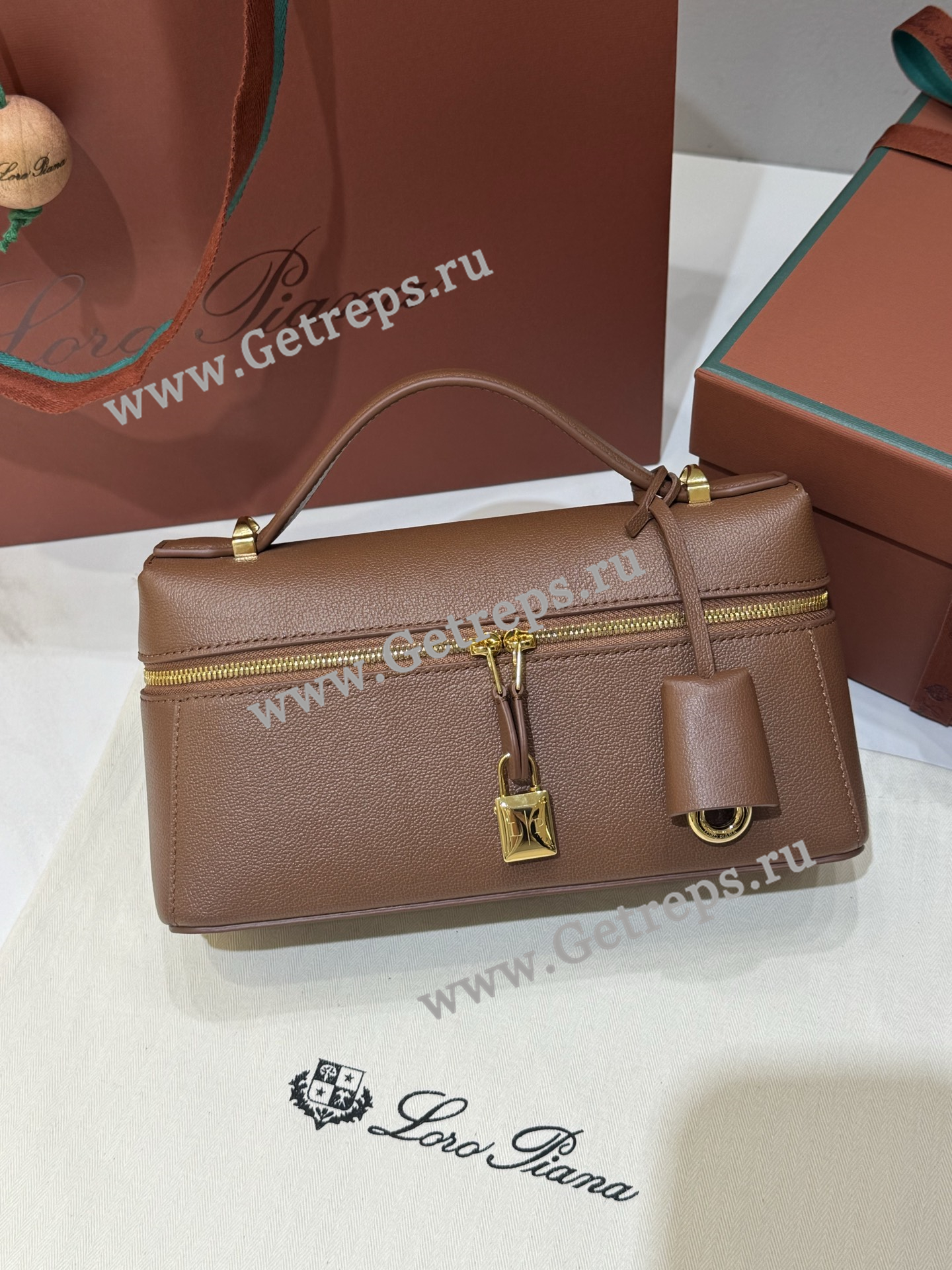 Loro-Piana-Extra-pocket-L23-Saddle-Leather-Brown.jpg