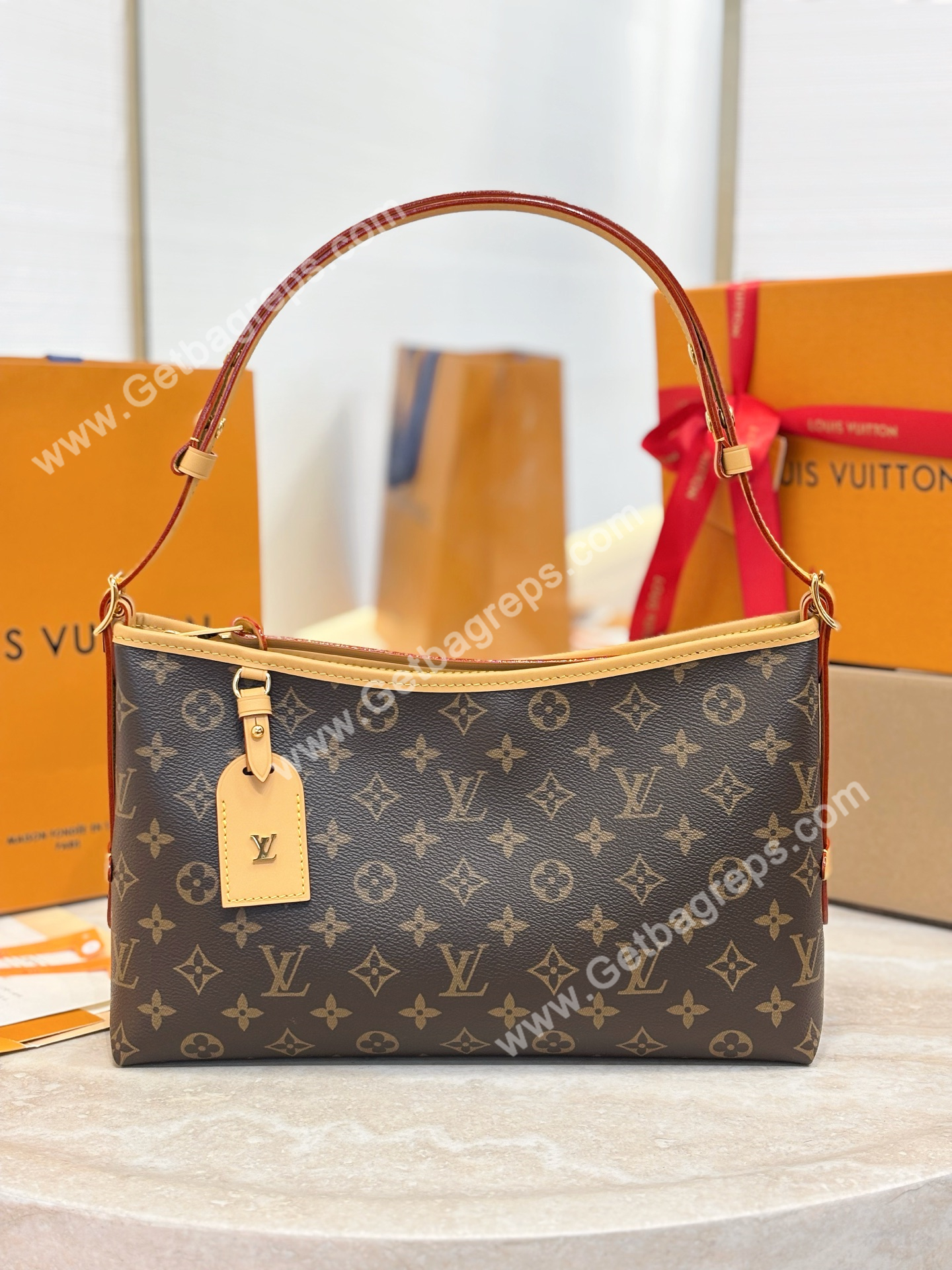 LV-M28101-Carryall-East-West-Monogram.jpg